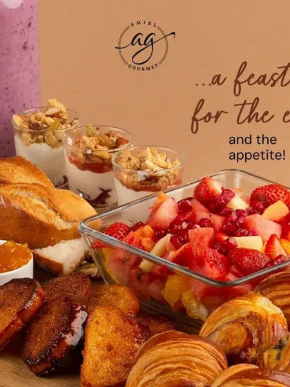 A closer look at my breakfast platter reveals a feast of textures and flavors. You'll find fresh fruit salad, mini parfaits, French toast, and a variety of my signature viennoiseries.