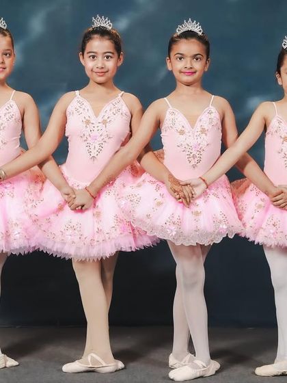 Our youngest ballerinas dressed for their 'Barbie x Swan Lake' performance. With their tiaras and pink tutus, they are ready to bring a touch of fairytale magic to the stage.