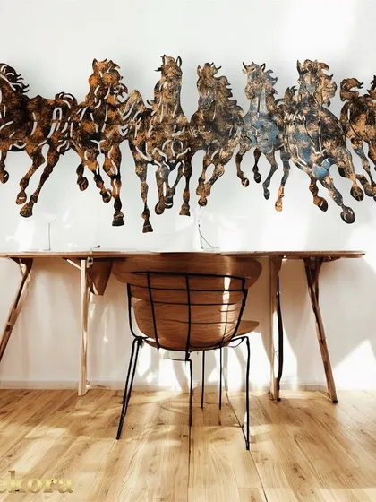 This large, dynamic 7 Horses metal sculpture is one of our most requested pieces. Handcrafted with intricate details, it symbolizes power and success, making it a perfect statement artwork for a living room, office, or entryway.