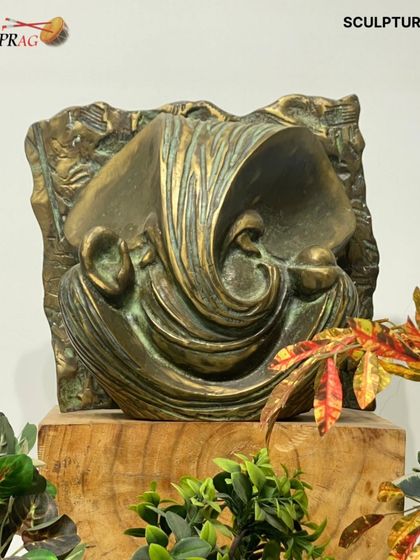 'Vignaharta', a contemporary bronze Ganesha sculpture, its abstract, flowing form balancing devotion with modern design.