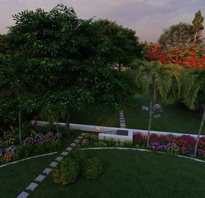 An aerial render of the Alibag property, showing the curved flowerbeds and pathways that create a soft, organic feel in the large garden.