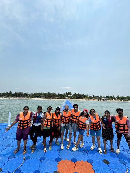 Posing on the floating bridge at Malpe beach near Udupi, a fun activity on our coastal Karnataka trip.