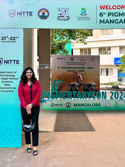 At the entrance of Pigmentarycon 2024 in Mangalore. Conferences like these are vital for staying updated on specialized topics like pigmentary disorders.