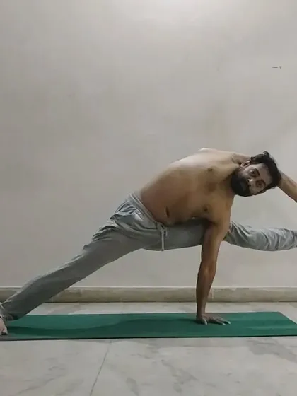 A challenging variation of side plank (Vasisthasana) that involves lifting and holding the leg. This asana builds incredible oblique, shoulder, and wrist strength.