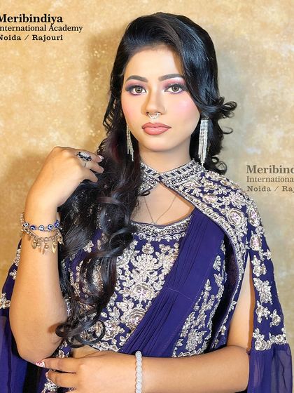 The full look, with an embroidered cape-style outfit, shows how to create a glamorous and cohesive style for evening events.