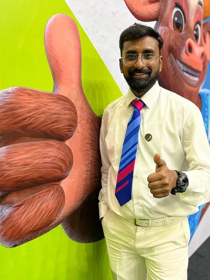 Posing at one of the promotional stands for the National Games 2023.
