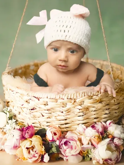 A simple and sweet bunny theme, with the baby peeking out of a wicker basket. The knitted bunny hat is one of many handmade props I use for my sessions.