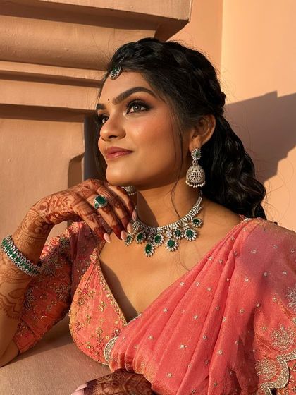 Another beautiful shot of the custom peach langa davani. The outfit was designed to be both traditional and comfortable for a long day of festivities.