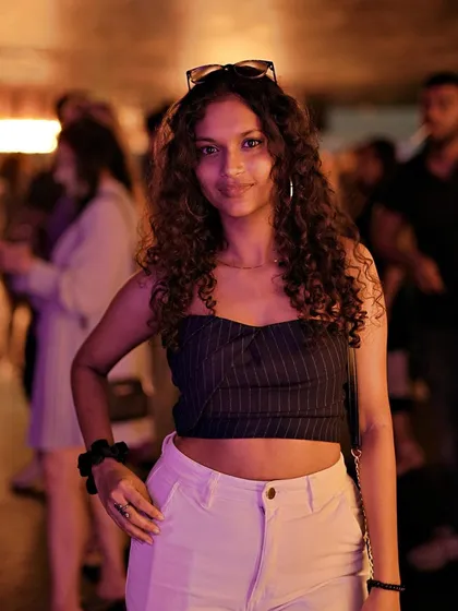A stylish guest enjoying the rooftop vibes.