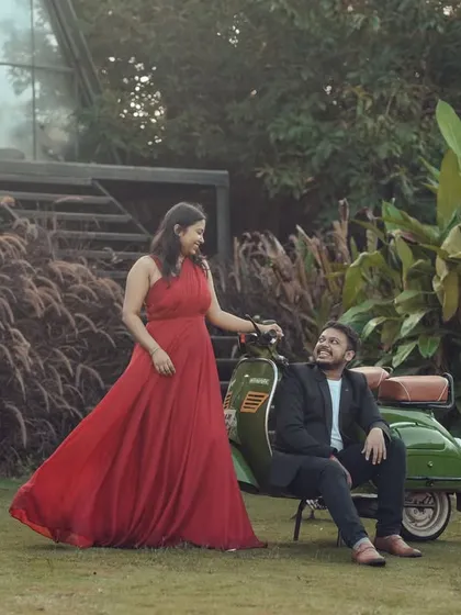 I create fun, vibrant memories with props like our vintage scooter. This couple's pre-wedding shoot in our lush garden set shows how we can match your outfits and personality to the perfect backdrop.
