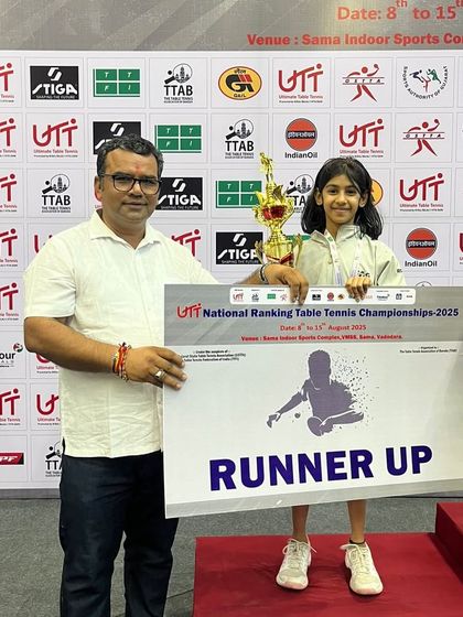 Saksha receiving her runner-up award at the same National Ranking Championships.