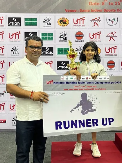 Saksha receiving her runner-up award at the same National Ranking Championships.
