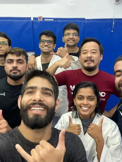 Thumbs up for another day of consistent effort and gradual improvement on the mats.