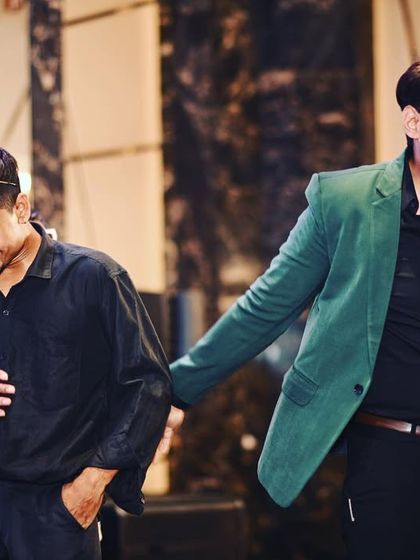 Sharing a laugh with a participant on stage. These genuine moments of fun are what make an event truly special and memorable for everyone involved.