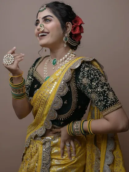 A candid moment from the student's portfolio shoot, showing the beautiful result of her hard work and training.