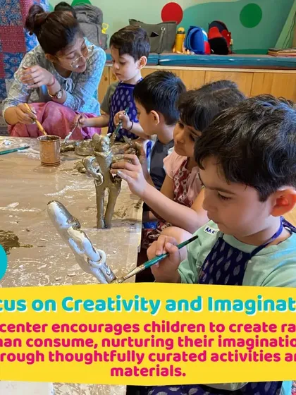 A group of children painting their clay creations. This multi-step process teaches patience and gives them a huge sense of accomplishment.