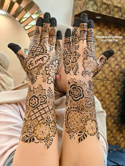 A guest showing off her stunning Dubai-style floral mehndi. This bold and beautiful design is perfect for making a statement at any wedding function.