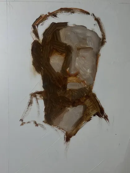 The first stage of the Grisaille portrait, blocking in the darkest shadow shapes to establish the structure of the face.