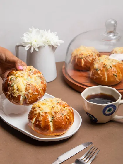 You have to try my signature Korean Cream Cheese Buns. They are fluffy, savory, and filled with a garlic cream cheese that is absolutely addictive. These are always the first to disappear at any party.