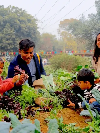 Family time is precious, and we love providing a space for you to create lasting memories. Here, a family learns together, exploring our fields and picking fresh, organic lettuce for their dinner table.