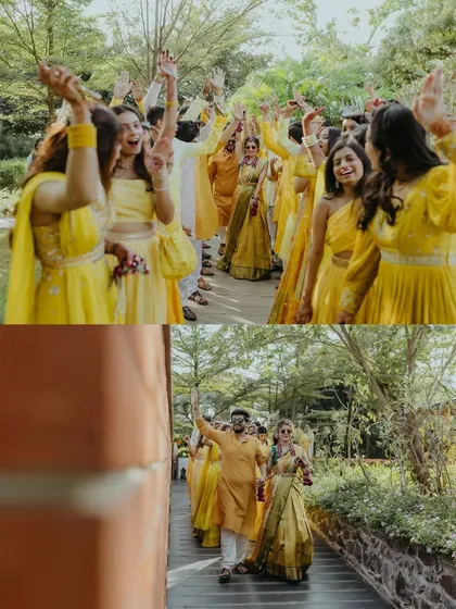 The grand entrance of the bride and groom at their Haldi ceremony, dancing with their enthusiastic friends and family.