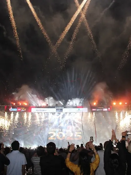 A spectacular fireworks display lights up the sky, marking the grand finale of the New Year's 2025 celebration at Goregaon Sports Club. We managed the complete pyrotechnics and stage production for this unforgettable night.