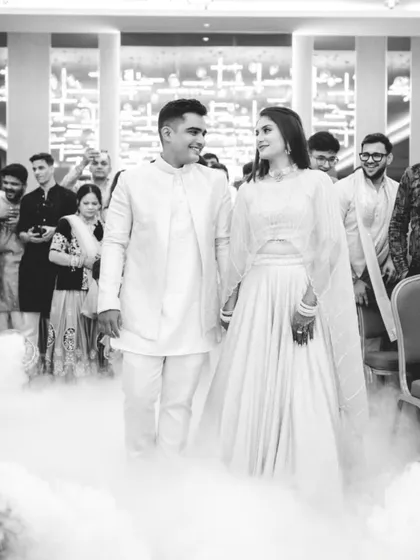 Making a grand entrance is a key part of any engagement party. I use techniques like this dry ice effect to create a dramatic, black and white photograph that feels like a still from a classic film.