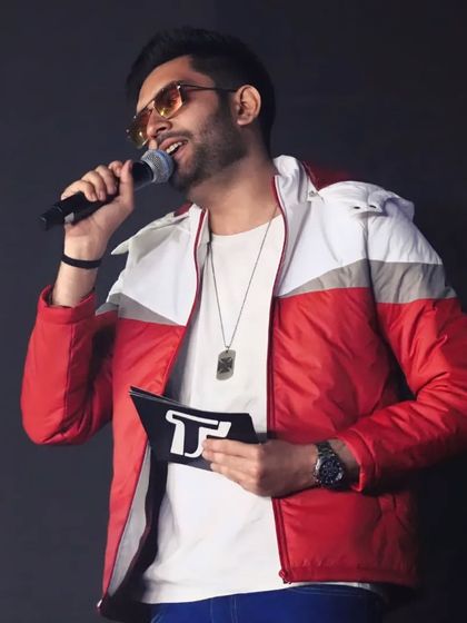 A close-up shot of me in my element, hosting the EDM concert at Techfest. The energy is always off the charts.