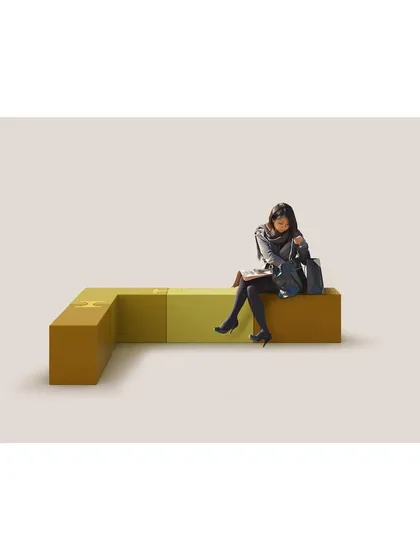 An L-shaped configuration of the LOKI bench, showcasing its ability to fit into corners and define spaces. The modular design allows for practical and creative layouts in any interior.