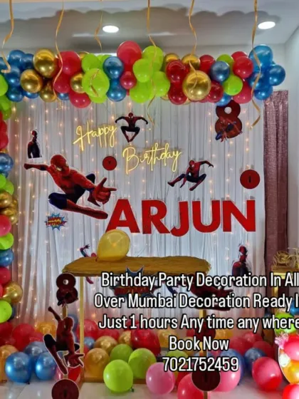 Your friendly neighborhood Spider-Man is swinging into the party. This action-packed theme features a red, blue, and gold balloon arch, multiple Spidey cutouts, and a personalized name banner for the birthday boy, Arjun.