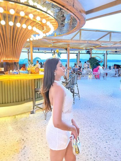 "Choose happiness." A shot from my visit to Kiki, a beautiful beach club in Goa, wearing a white lace dress.