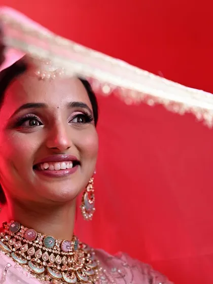 Simplicity at its most beautiful. For Mokshi's wedding, we created this soft and simple look with pink eyeshadow and a natural base that let her stunning jewelry shine. 🩷