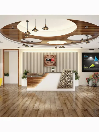 The reception area is the first impression of a business. For SVG Exports, we designed a welcoming yet professional entrance featuring a custom desk with patterned CNC-cut panels, a unique circular ceiling design with wood accents, and strategic lighting to create a memorable entry experience.