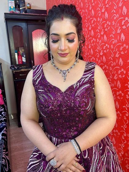 A full look at the party-ready client. The gown fits her perfectly, and she looks absolutely radiant.