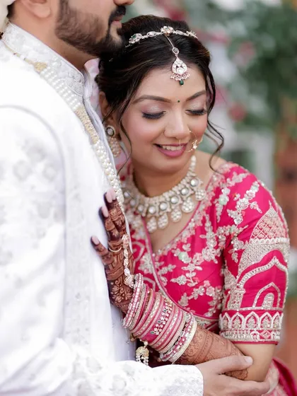 Different angles of my beautiful bride Hetvi, showcasing her traditional and elegant wedding look that perfectly complements her vibrant pink lehenga.