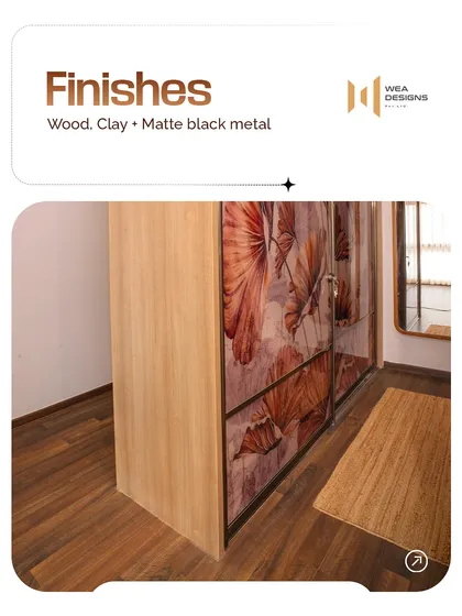 Japandi design is all about finishes. This wardrobe features a beautiful wood finish with a printed floral design, complemented by matte black metal details.