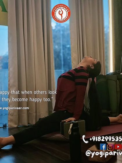 A student finds joy and openness in this variation of Eka Pada Rajakapotasana, using blocks for support.