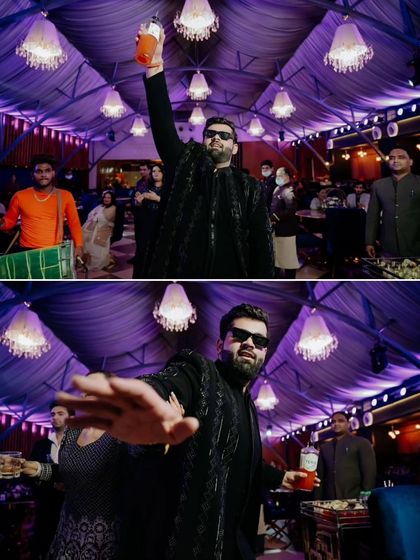 More moments from a client's cocktail party. Our custom black embellished outfit ensures the groom is the center of attention all night long.