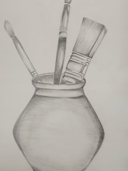 A still life of artist's brushes in a pot, a subject close to our hearts.