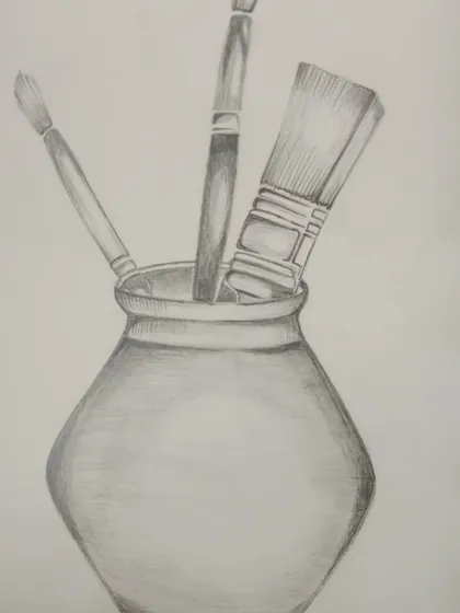 A still life of artist's brushes in a pot, a subject close to our hearts.