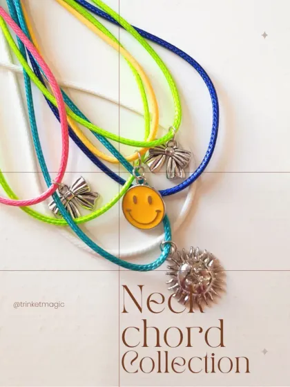 A colorful pile of my neck cord necklaces, featuring a variety of charms and vibrant cord colors. They are lightweight, trendy, and affordable.