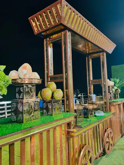 The golden-striped coconut water cart, an elegant and healthy addition to any wedding menu.