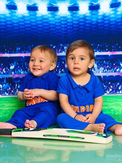 A future opening pair for India. This twin photoshoot with a cricket theme is perfect for a sports-loving family.