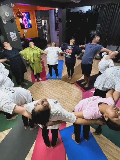 Another perspective of our group backbend circle, showing the beautiful symmetry and connection we create together.