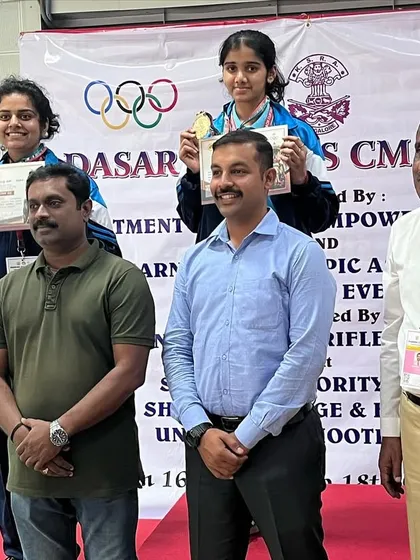 Anushka on the podium after her Gold medal win in the 50M 3-position rifle women's event at the Dasara Games.