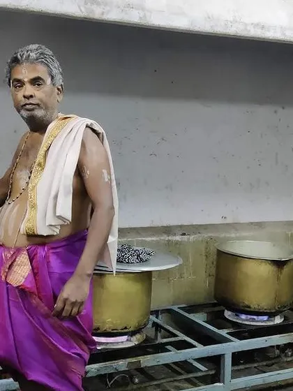 Our head cook, continuing the family parampara, prepares a large batch of food in traditional brass vessels. We wear the panche to honour our heritage and bring a complete cultural experience to your event.