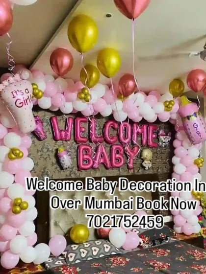 Even in a smaller space like a bedroom, I can create a beautiful and intimate welcome for your baby. This setup for a baby girl uses a balloon arch over the bed with pink, white, and gold balloons, along with 'It's a Girl' and baby bottle foil balloons.