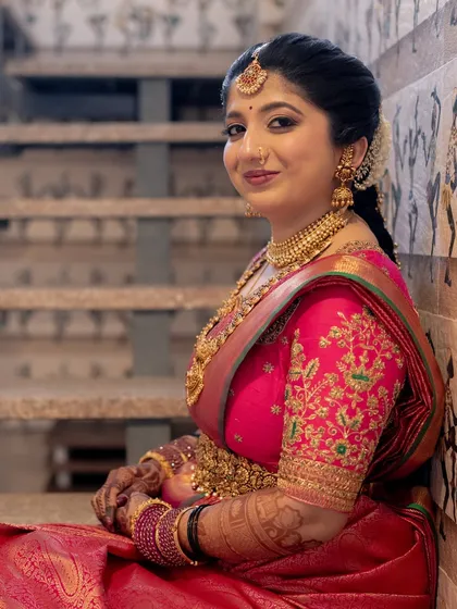 A beautiful shot of the bride sitting on the stairs, her elegance and grace shining through.