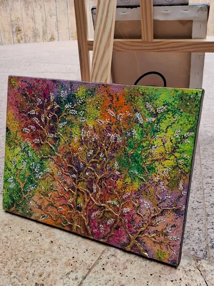 This vibrant, textured tree painting is an example of what you can create in our workshops. We guide you through techniques to build layers and use color, helping you produce a finished piece ready to display.