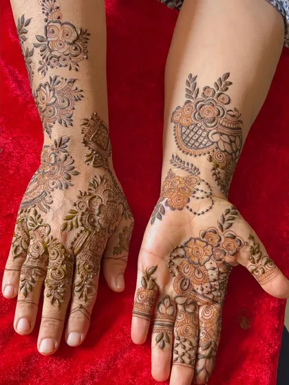 An elegant floral design for the hands. This style is lighter than full bridal but just as beautiful.
